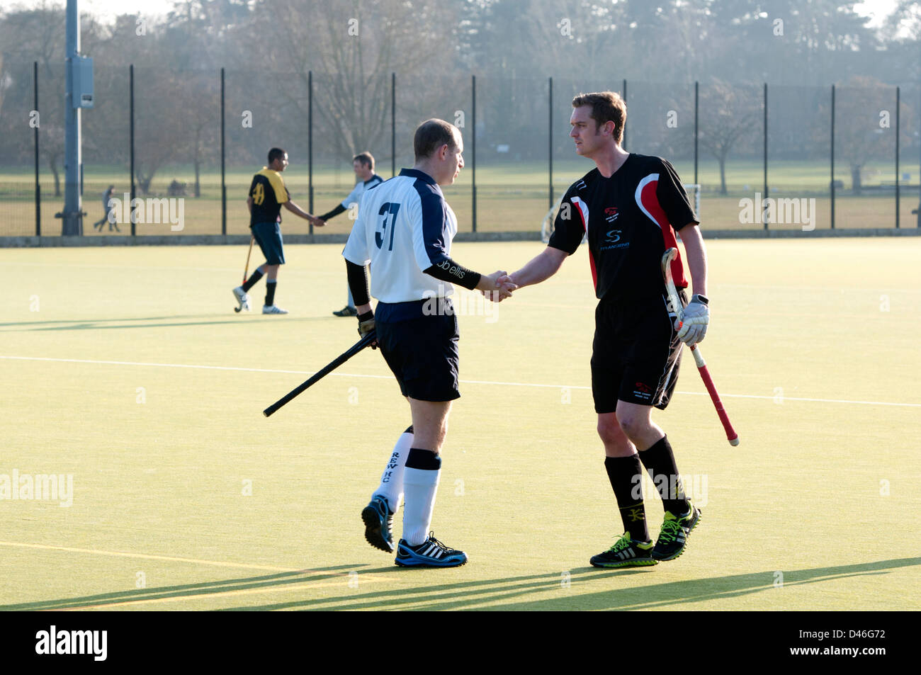 Men`s hockey at club level, shaking hands after match. Stock Photo